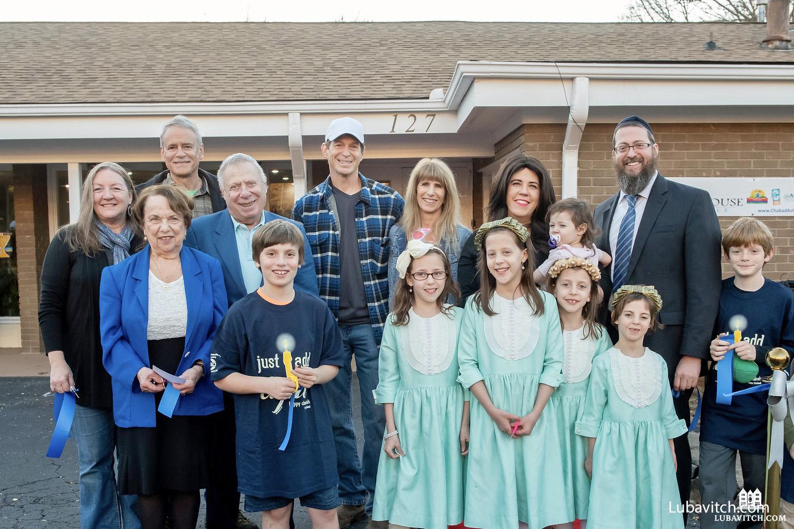 The Susskind family pose with dignitaries at the Grand Opening of Chabad House of Asheville, North Carolina